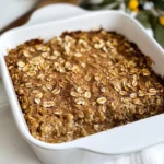 Full dish of coffee cake baked oatmeal with one slice removed